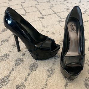 Carlos Santana black stilettos